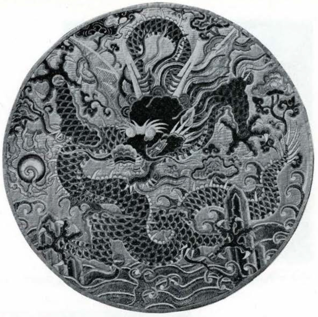 Circular medallion from Emperor's robe, five-clawed winged dragon (ying) chasing pearl. 