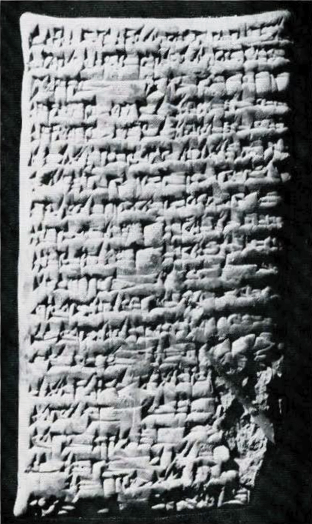 A rectangular tablet covered in lines of cuneiform inscription.