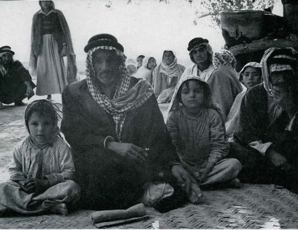Sheikh Suleiman sitting with a group of people.