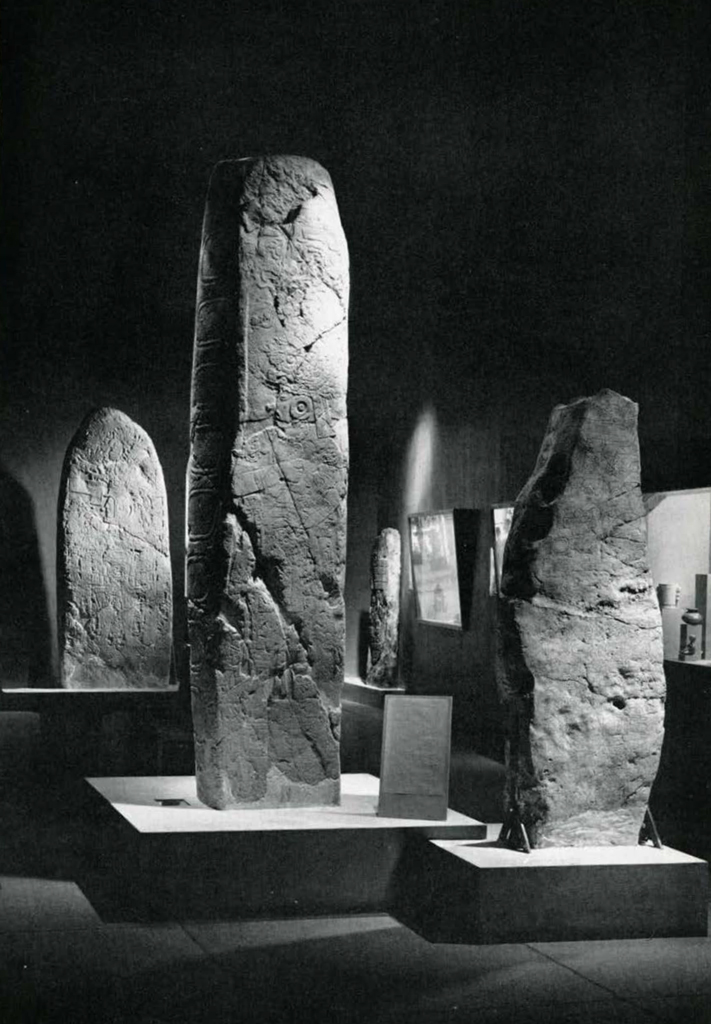 Three massive stone stelas in the American galleries.