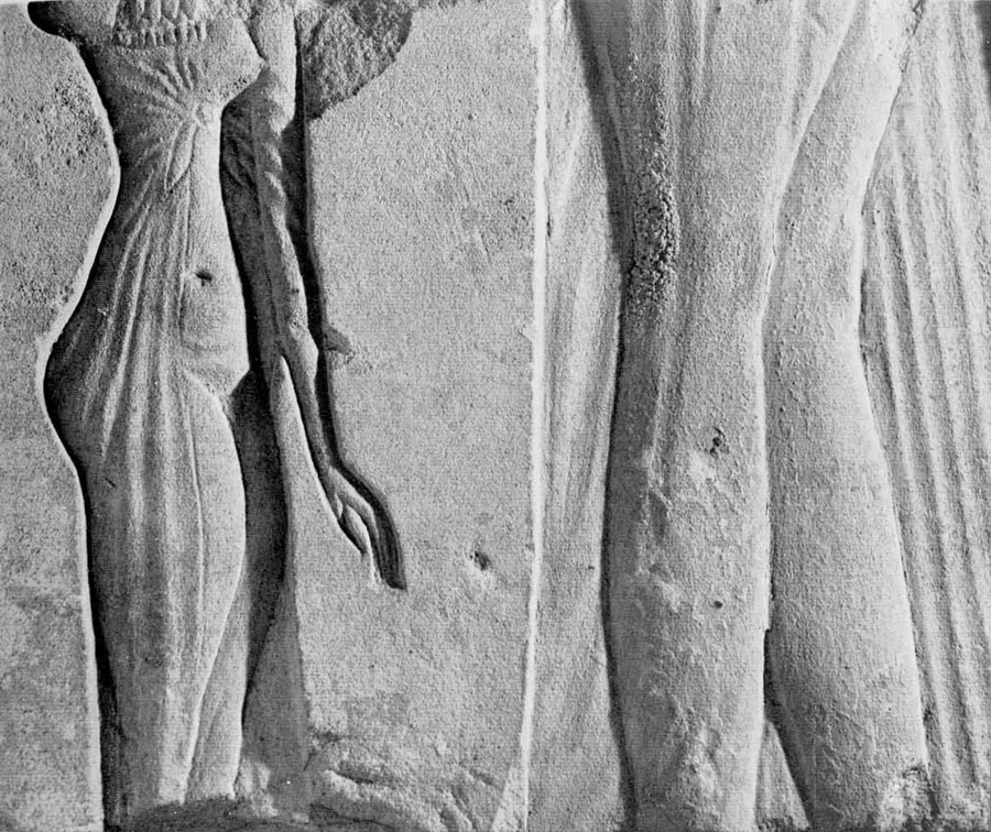 Portion of a relief showing two women.