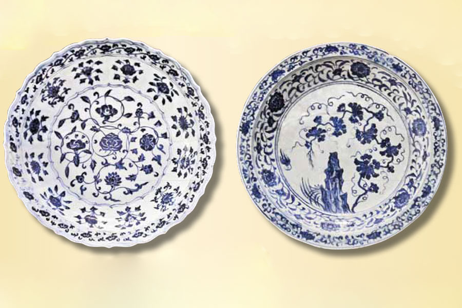 Two Ming porcelain plates with blue floral designs.