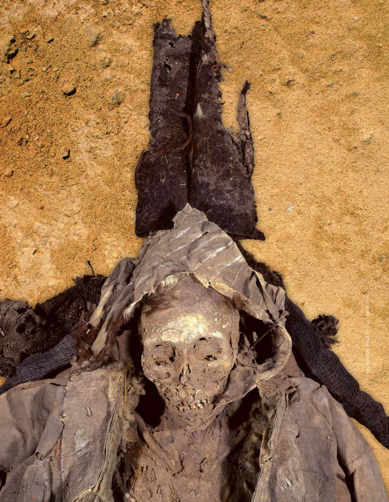 A mummy from the Tarim Basin, buried with a hat above it's head
