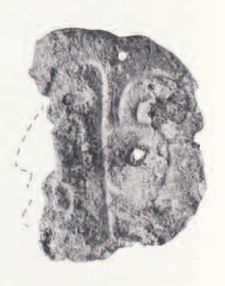 Fragment of a pendant, remaining pieces shown in a dotted line.