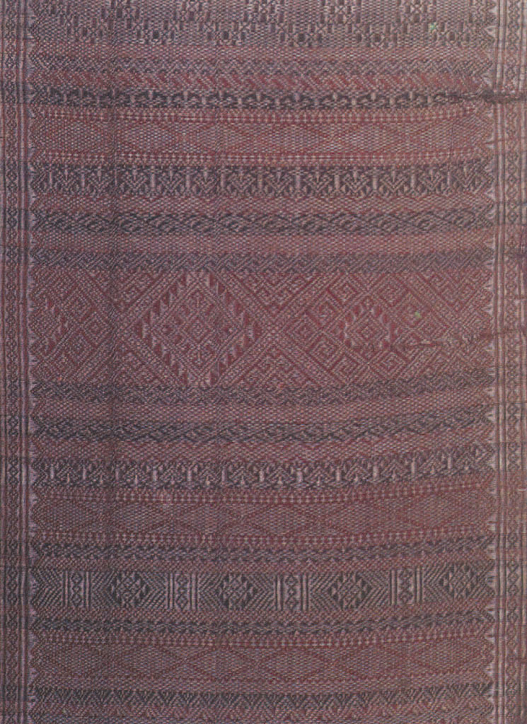 A woven shawl with registers of a variety of repeated pattern motifs.