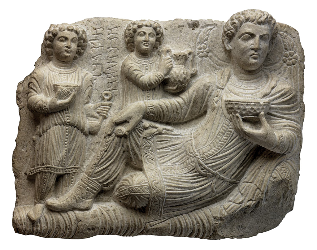 A relief portrait of three people.