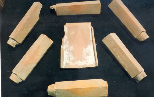Pieces of architectural terracotta laid out next to each other.