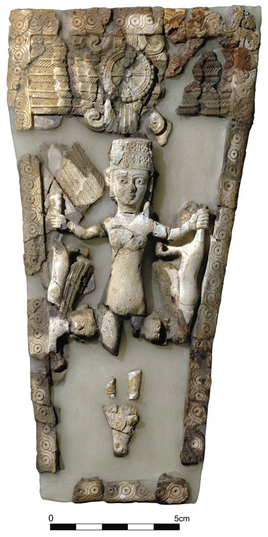 Pieces of an artwork put together to show a figure holding animals in either hand.