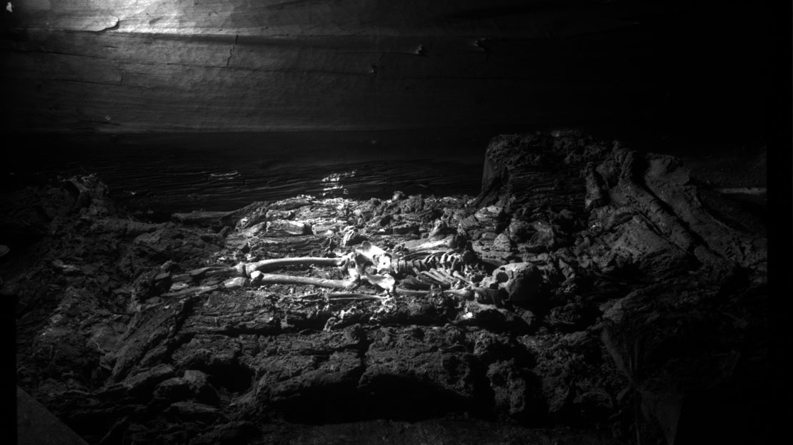 Remains in a burial chamber.