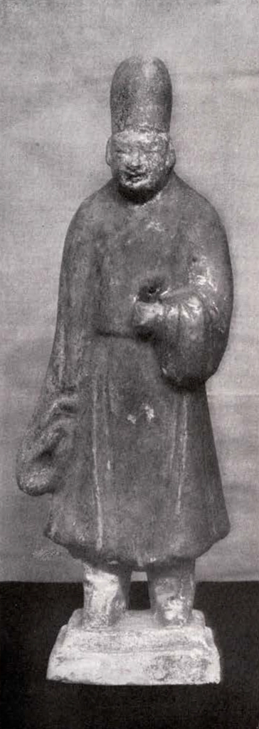 figurine of a standing man with a cylindrical hat
