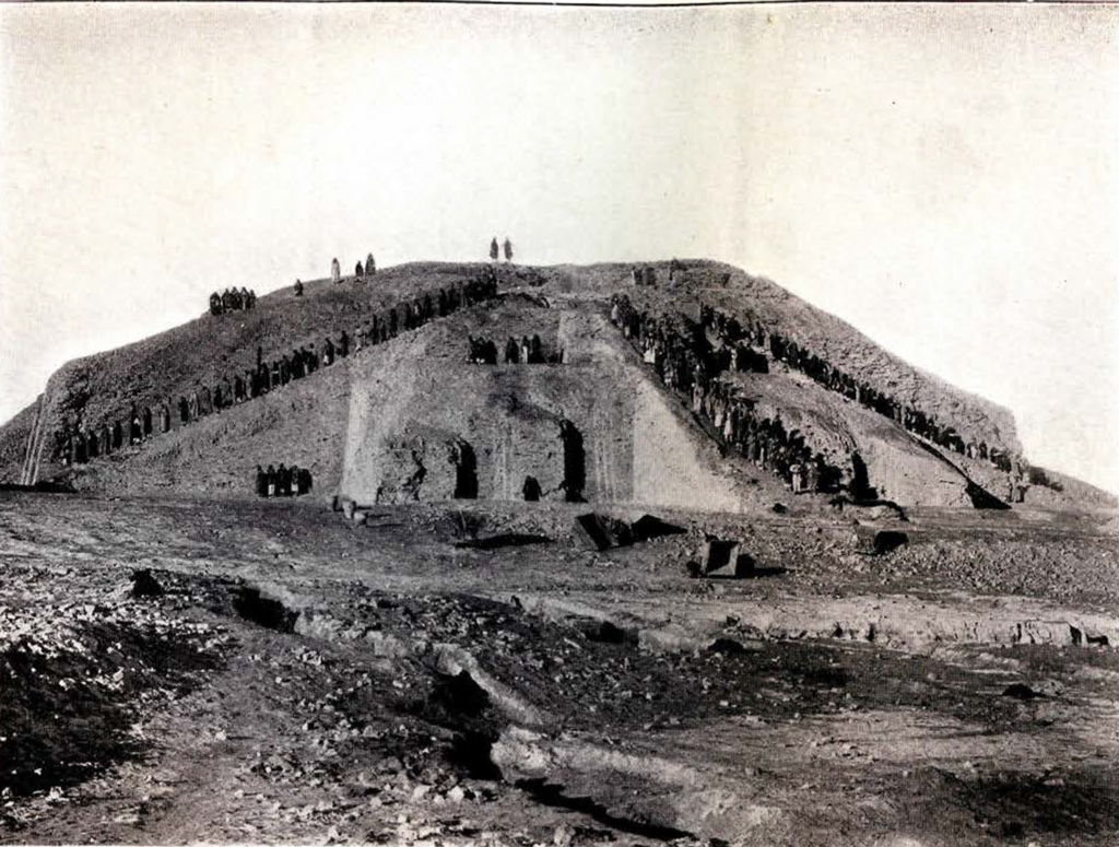 The Ziggurat in the middle of excavation, with three staircases full of people leading up to the top