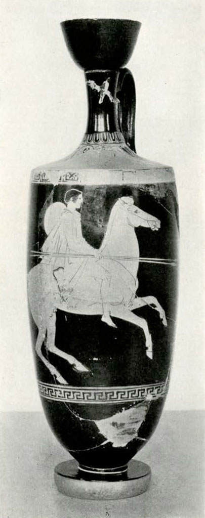 A tall vase showing a figure on horseback