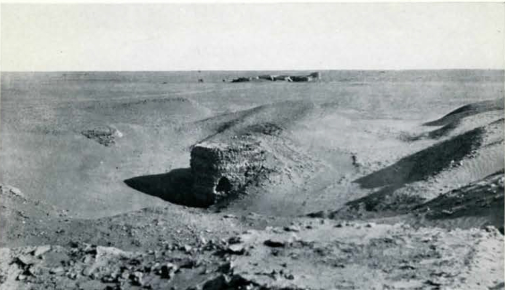 A desert landscape with a granary in the sands