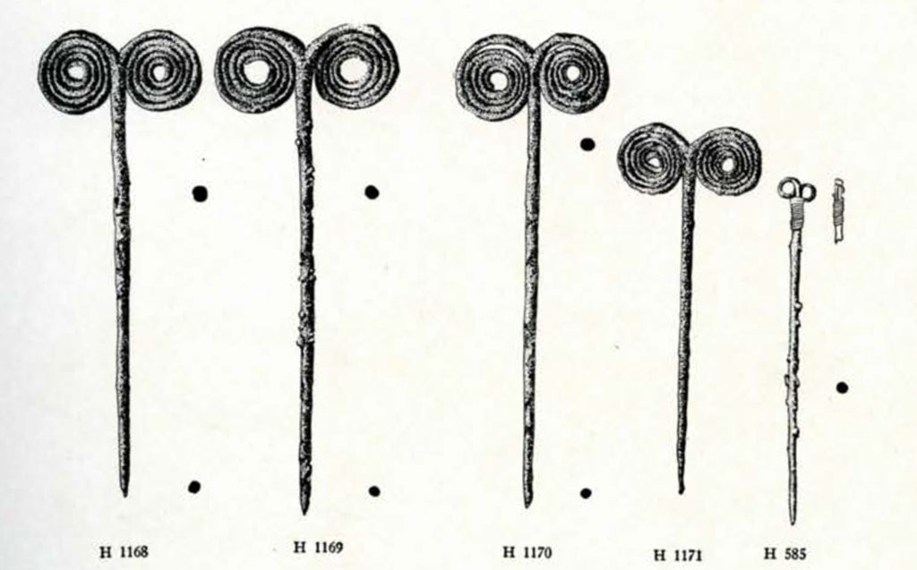 Five drawings of copper pins each with two opposite facing spirals at the head