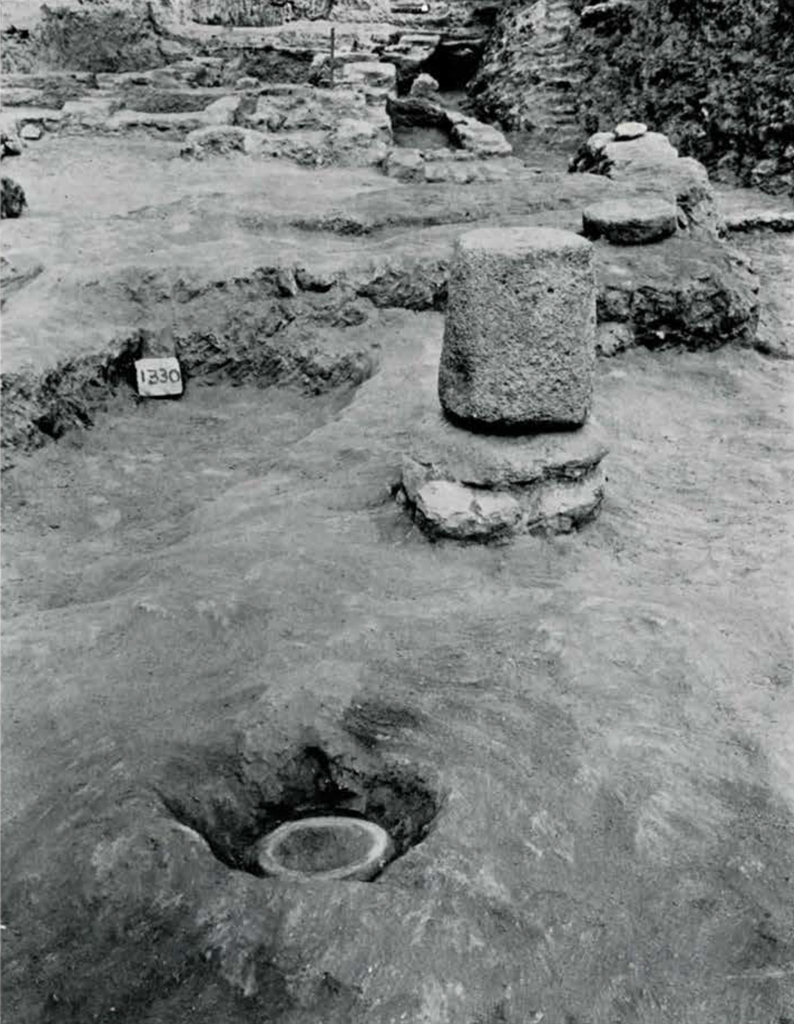 Excavated short column with a drain a few feet away