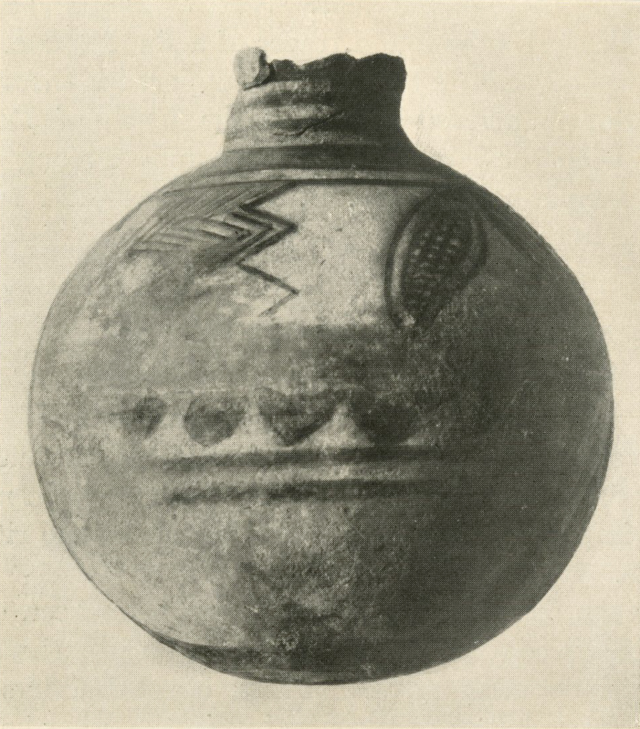 Spherical bodied pot with painted designs