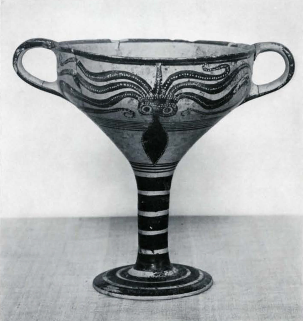 A kylix with two handles and an octopus design on the outside