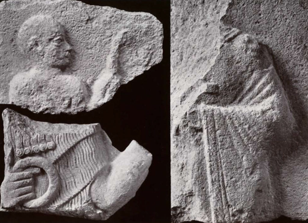 Pieces of a stela showing shoulders and head of a figure, hand and ring, and shoulder and arm of a figure