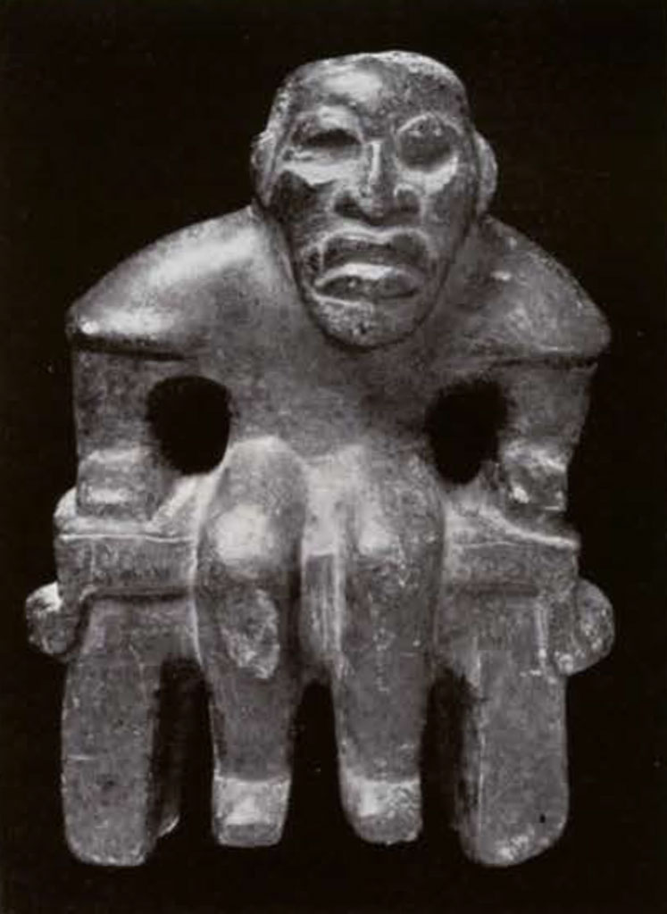 A seated figure
